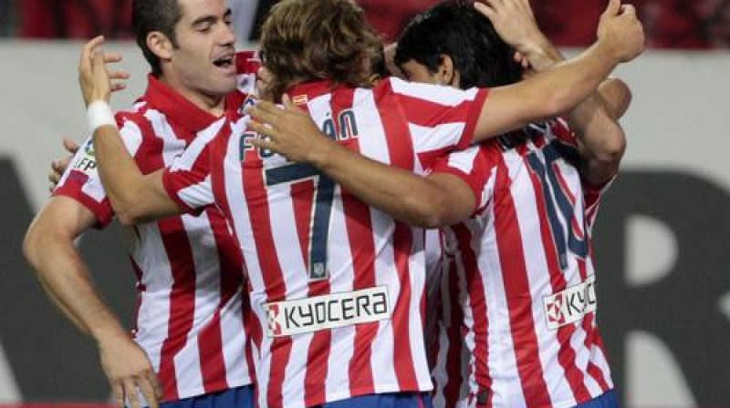 Madrides "Atletico" futbolisti atzīmē pirmo vārtu guvumu
Foto: AP