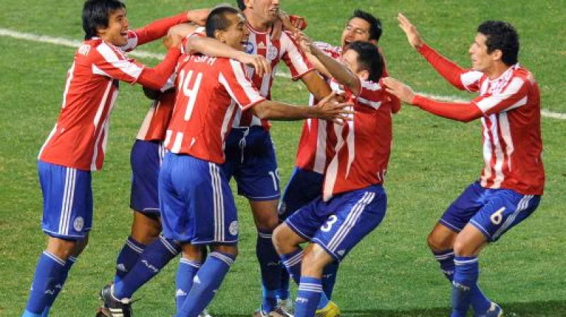 Paragvajas futbolisti līksmo
Foto: AFP/Scanpix
