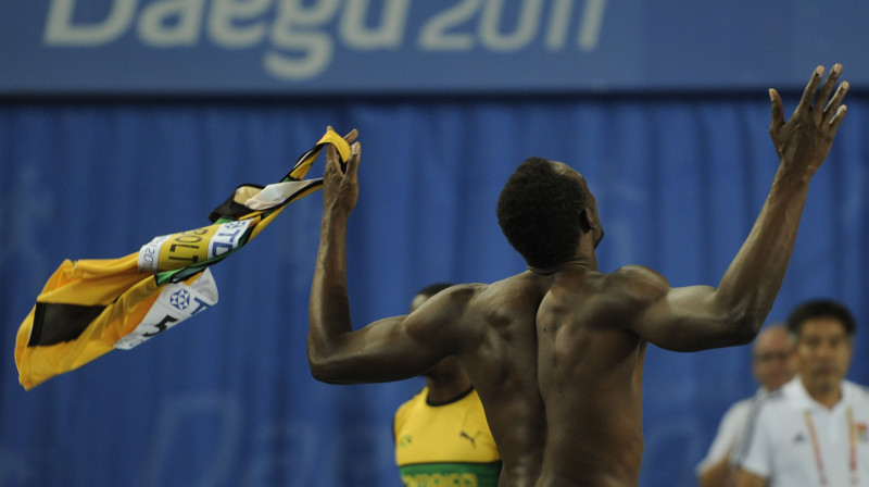 Useins Bolts pēc pāragrā starta pasaules 
čempionāta finālā. Foto: AFP/Scanpix