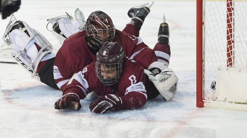 Jānis Voris un Andrejs Kostjuks
Foto: Andrea Cardin/HHOF-IIHF Images