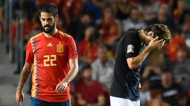 Lukas Modriča (pa labi) emocijas spēlē Spānijā. Foto: AFP/Scanpix