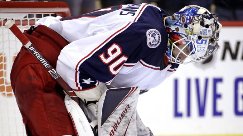 Elvis Merzļikins savā pirmajā NHL spēlē. Foto: AP/Scanpix