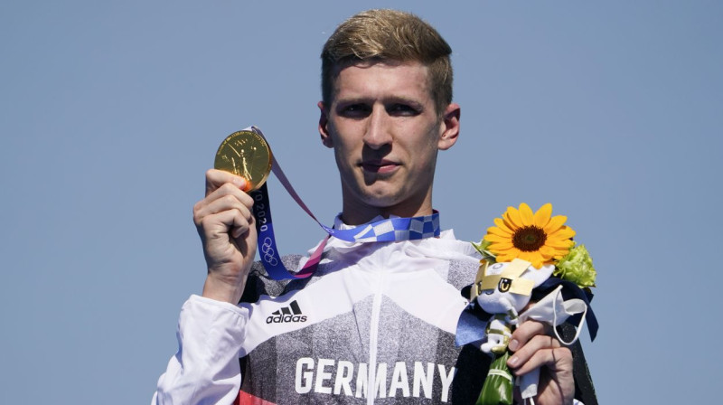 Olimpiskais čempions 10 kilometru peldēšanā Florians Velbroks. Foto: Jae C. Hong/AP/Scanpix