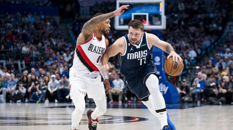 Deimiens Lilards un Luka Dončičs. Foto. USA Sports Today